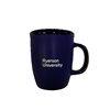 A navy blue ceramic coffee mug with Ryerson University white text appearing on the side.