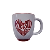 A white ceramic coffee mug with Ryerson University in red text appearing on the side in the shape of a heart.
