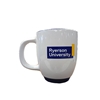 A white ceramic coffee mug with the Ryerson logo appearing on the side
