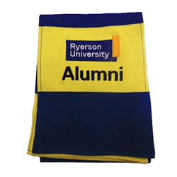 A blue and yellow scarf with the Ryerson University Logo and black Alumni text embroidered on one end.