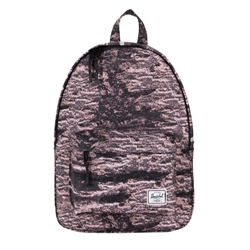 A Herschel backpack with an abstract pink and black pattern. Front pocket has the Herschel logo embroidered in white and black on the bottom right corner.