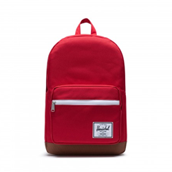 A red Herschel backpack with a red front pocket and brown leather detail on the bottom. Front pocket has the Herschel logo embroidered in white and black on the bottom right corner.