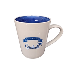 A white coffee mug with Ryerson University in a blue banner and Graduate in blue text appearing on the side. Inside the mug is royal