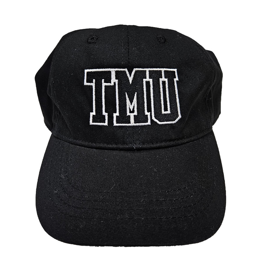 A black ballcap with an adjustable back closure, and embroidered varsity "TMU" logo centred on the front.