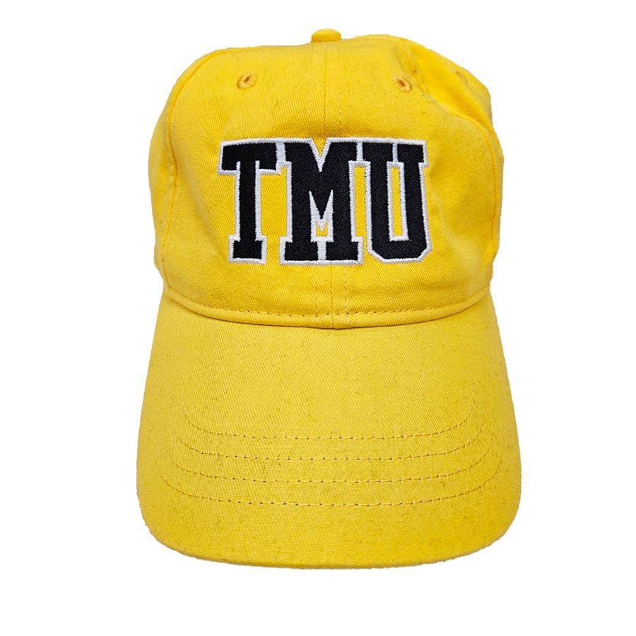 A yellow ballcap with an adjustable back closure, and embroidered varsity "TMU" logo centred on the front.